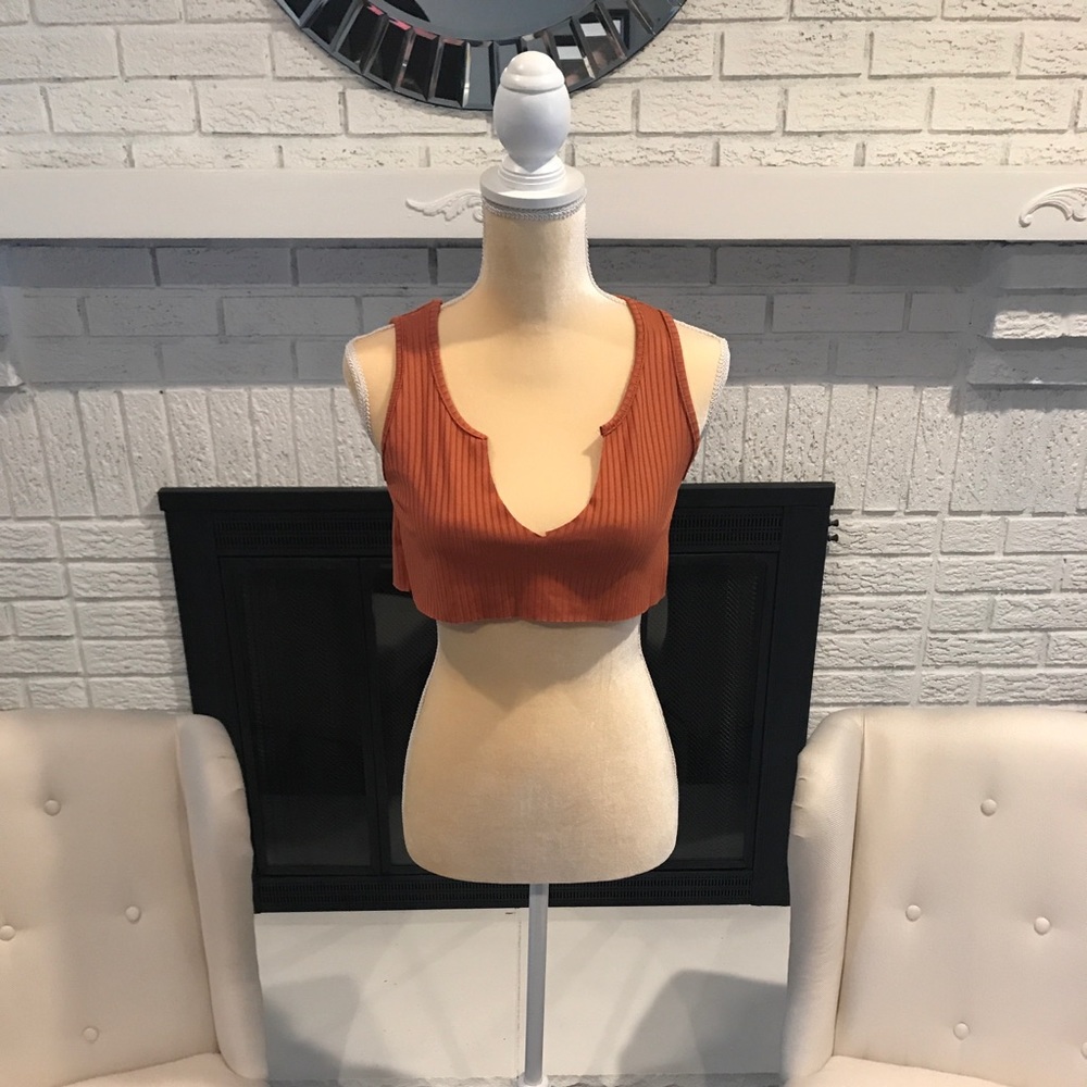 Orange crop top.